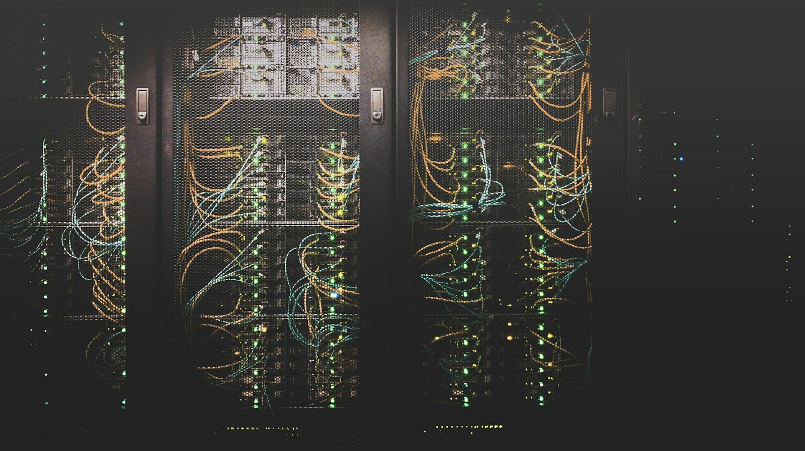 Rows of server racks with neatly routed network cabling