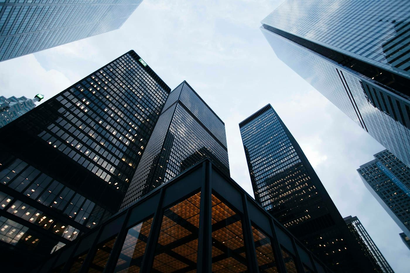 Glass office towers seen from street level